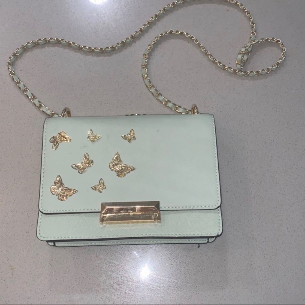 ALDO mint green bag with gold butterflies